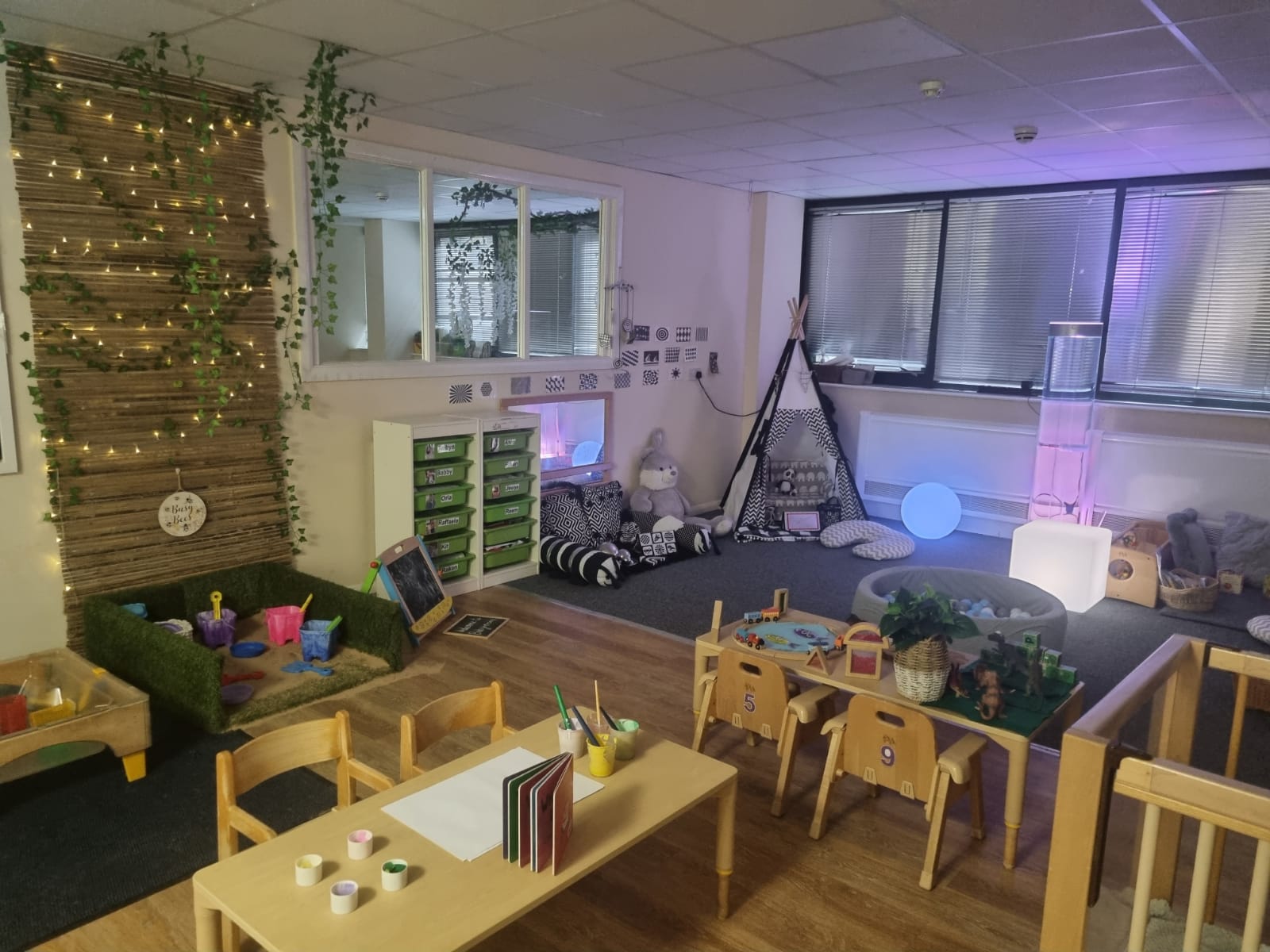 Manchester nursery room with a teepee, art table and calm lighting